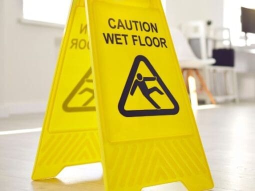 Caution wet floor health and safety sign